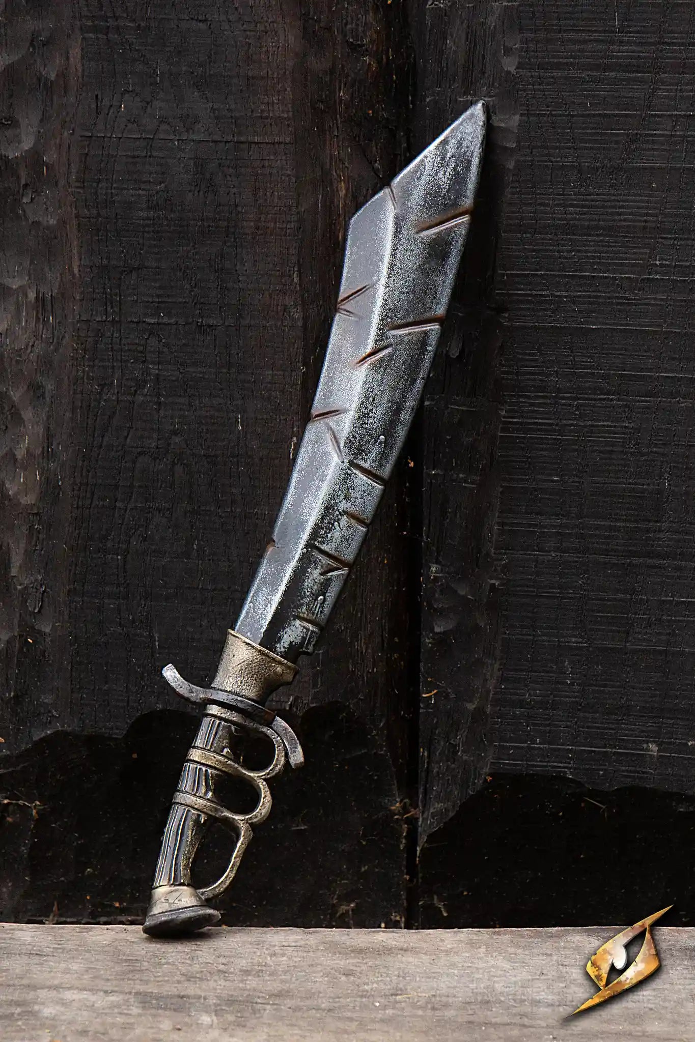 Battleworn Trench Knife with intricate knuckleduster handle, featuring a curved blade and a battle-worn finish.