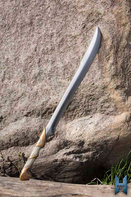 Elven Hunter Blade displayed against a natural stone backdrop, highlighting its elegant design and craftsmanship.