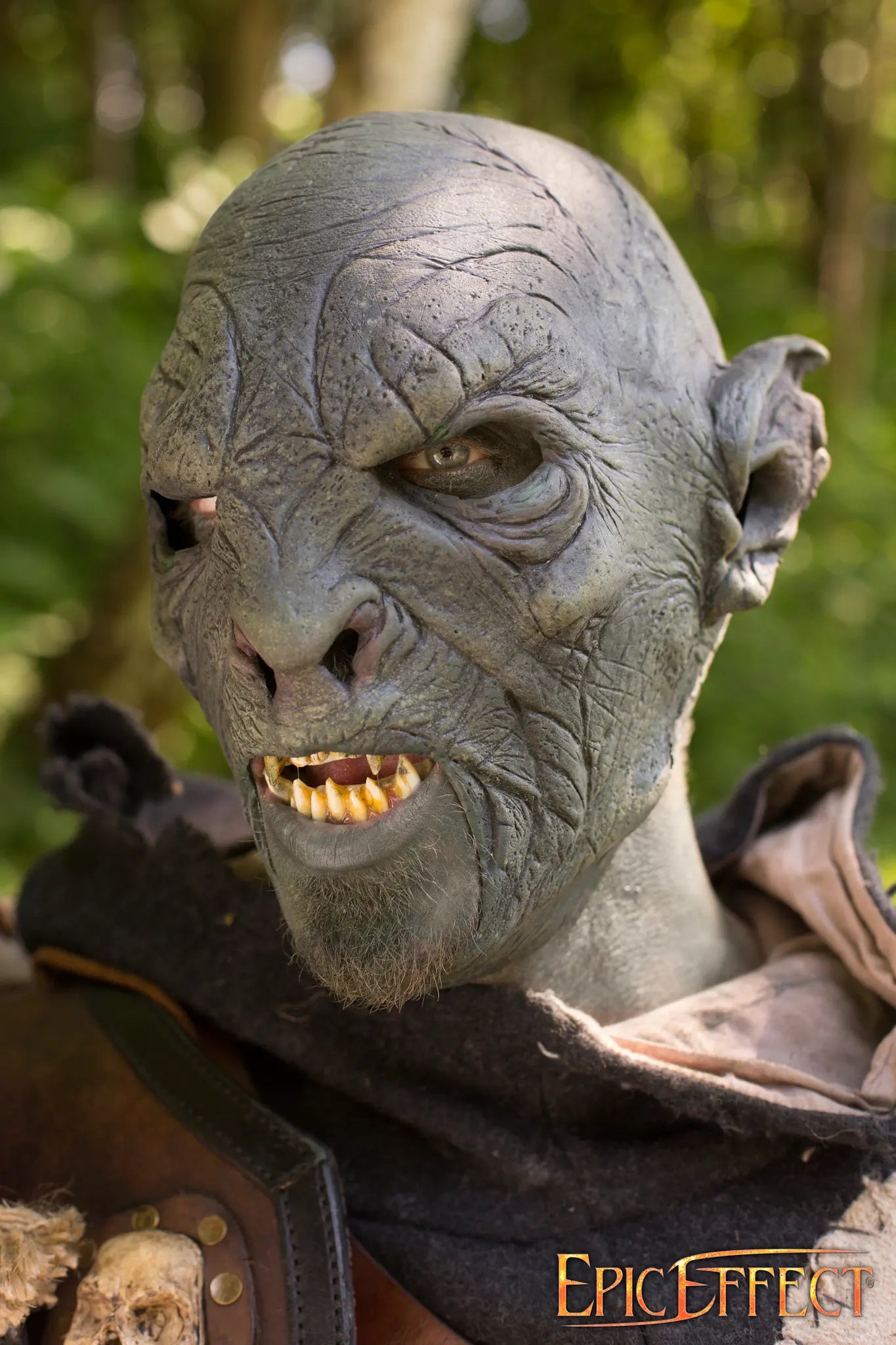 Close-up of a Beastial Orc costume character with detailed features and fierce expression.