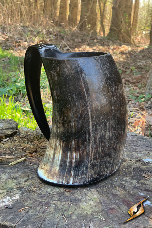 Barbarian Mug handcrafted from authentic bull horn, perfect for toasting and storytelling, holding a litre of drink.