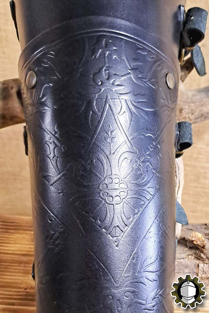 Leg Protection Brian (Fighter) detailed design showcasing intricate embossed patterns on protective gear.