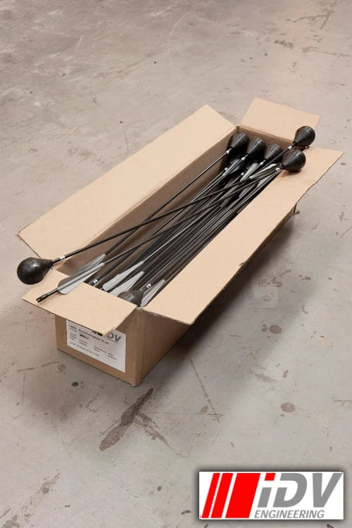 Arrow - Round Head - Black Shaft in a cardboard box, showcasing multiple arrows ready for archery practice.