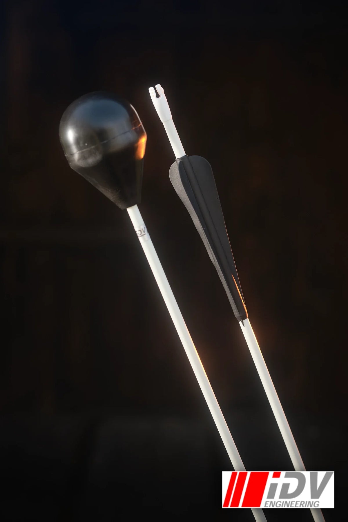 Arrow - Round Head - White Shaft displayed with a black round head and a sleek white shaft.
