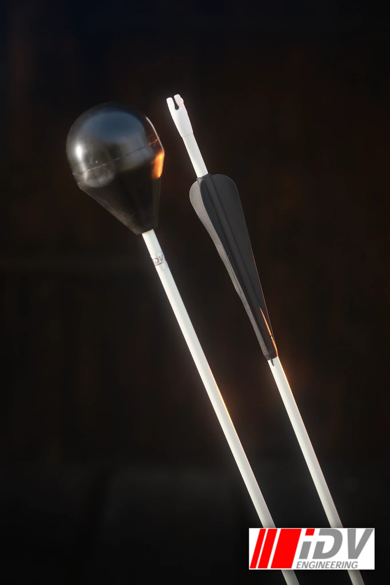Arrow - Round Head - White Shaft displayed with a black round head and a sleek white shaft.