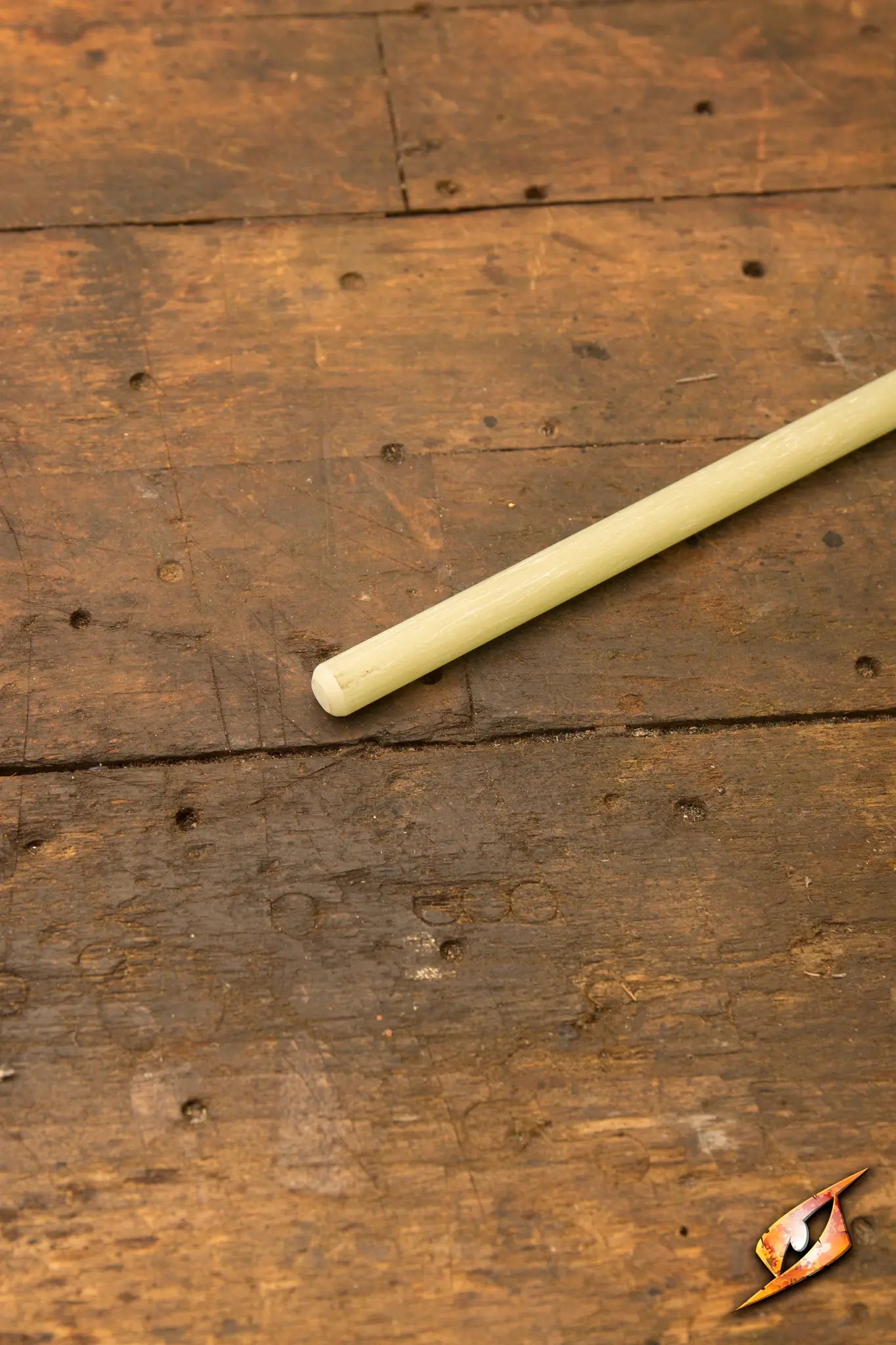 Glasfiber Core displayed on a wooden surface, used for creating LARP weapons.