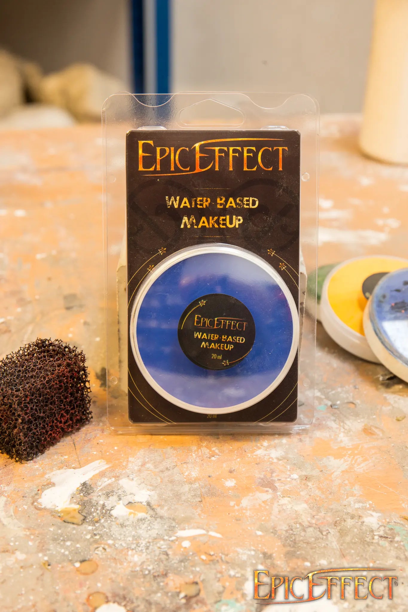 Water Based Make Up - Blue by Epic Effects in compact packaging on a work table.