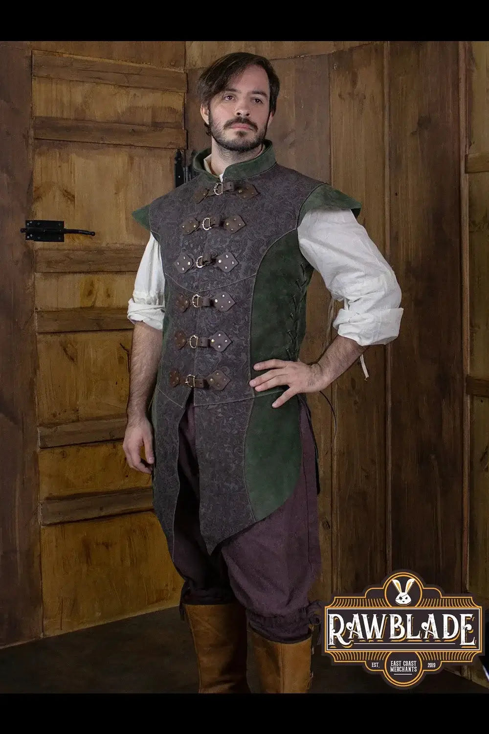 Yalon Long Jerkin Deluxe worn by a model, featuring an elegant design suitable for a bard or noble character.