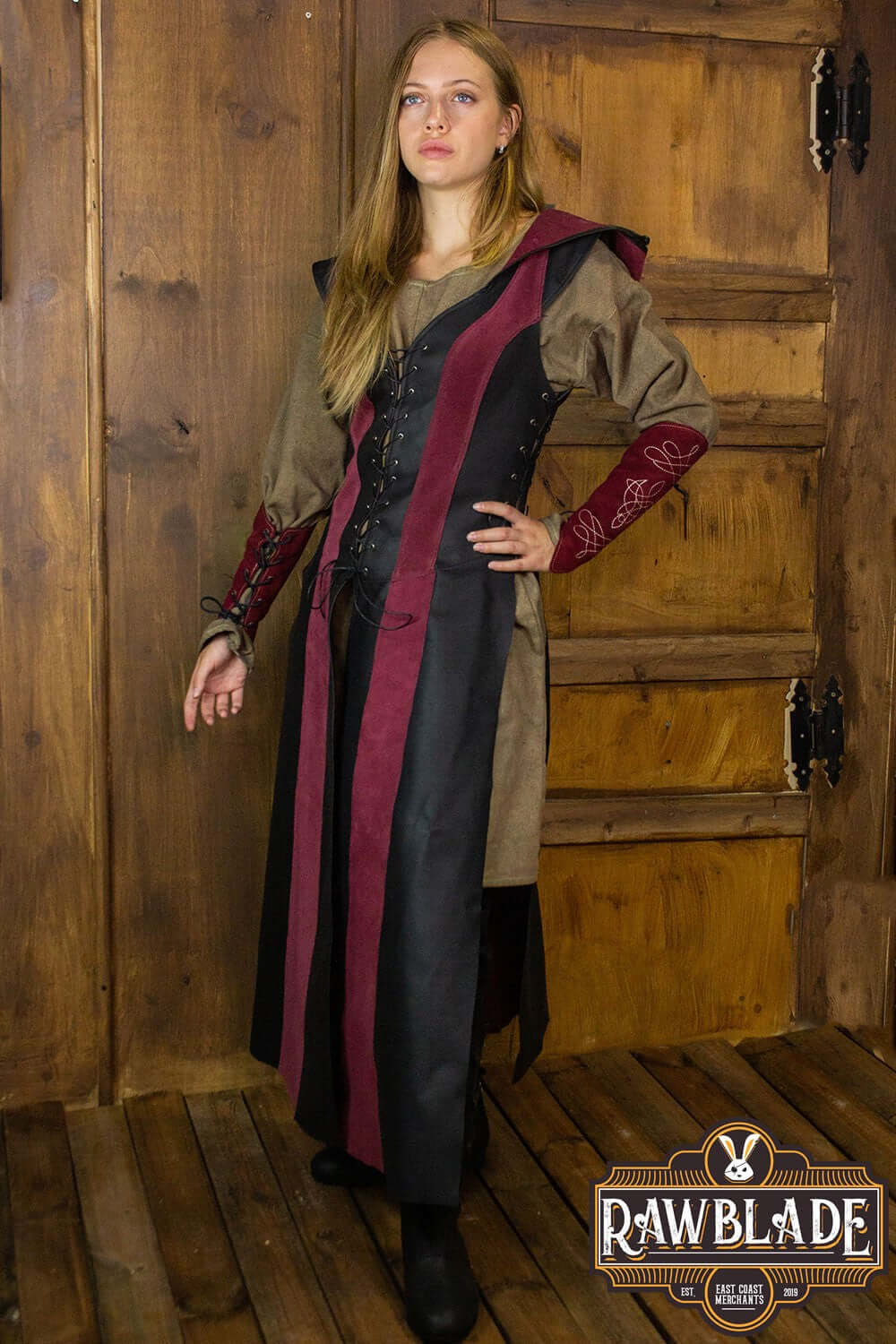 Arylith Archer Leather Tunic displayed on a model, featuring adjustable drawstrings and an elegant hood.