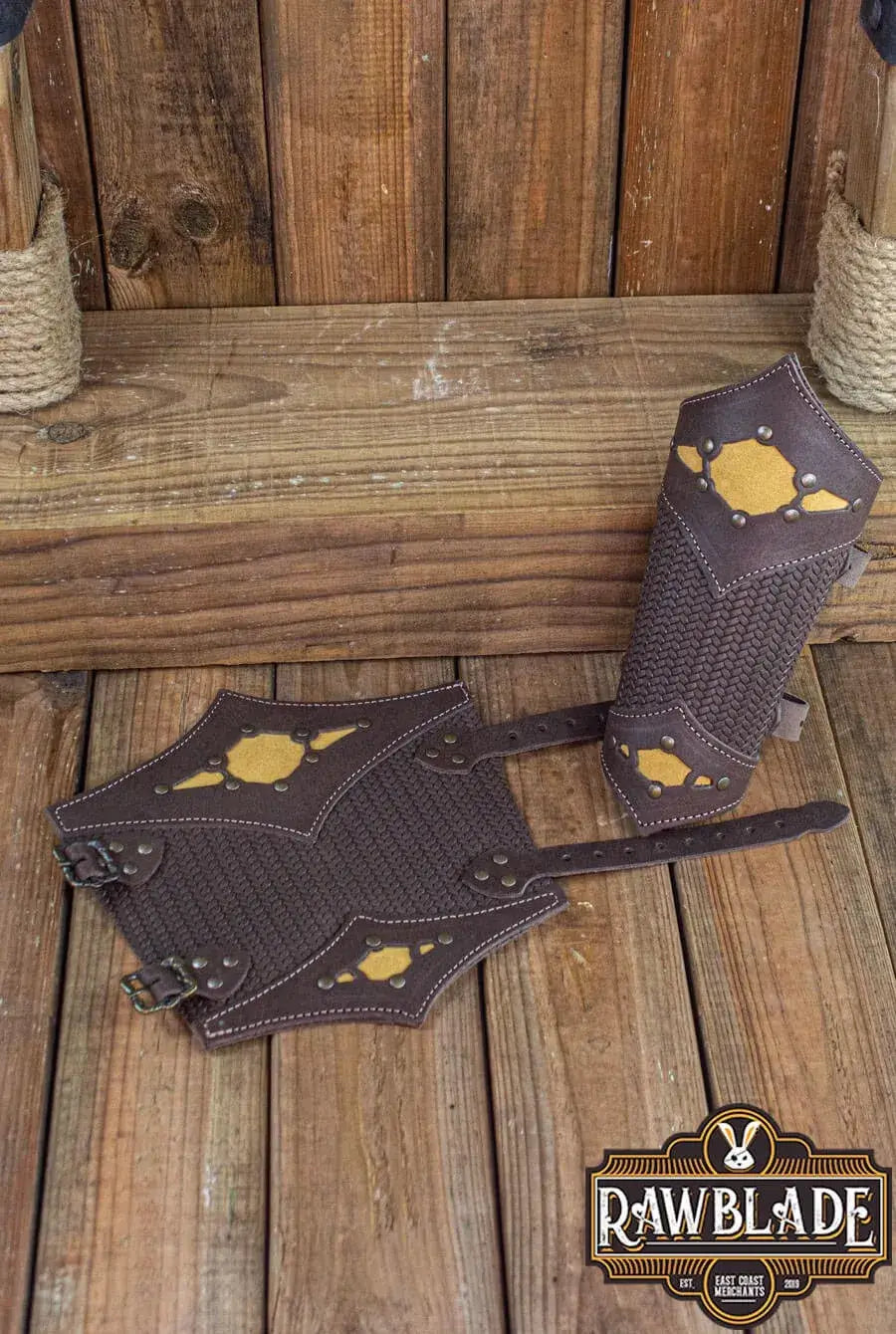Beljant Bracer displayed on wooden background, featuring durable design and colorful diamond options.