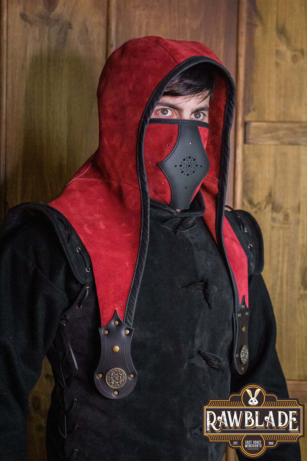 Akku Splitleather Hood worn by a model showcasing its design and features, including leather reinforcements.
