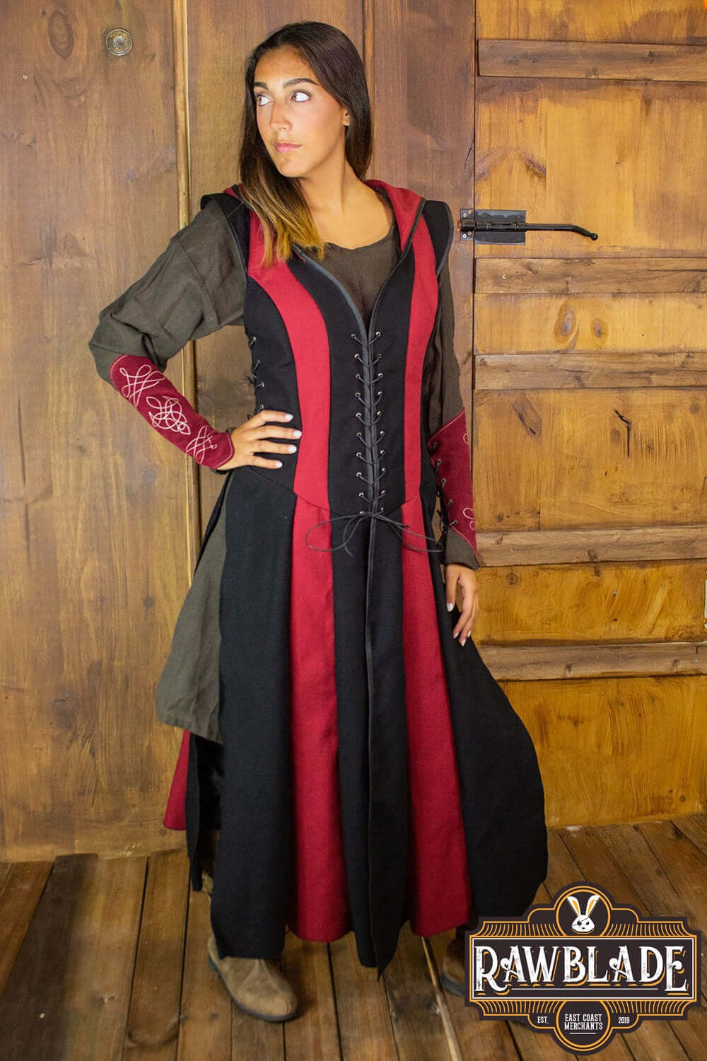 Arylith Archer Cotton Tunic on model, featuring adjustable drawstrings and elegant wide hood, showcasing unique design.