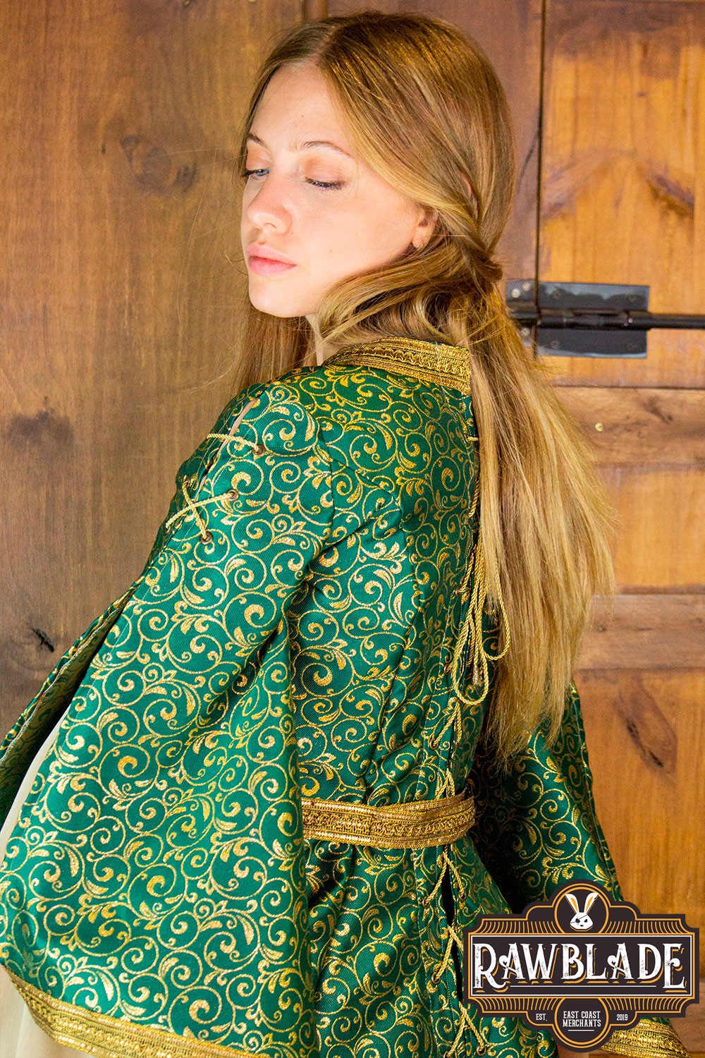 Aquitania Noble Dress in green brocade with gold trims, perfect for medieval events and larp.