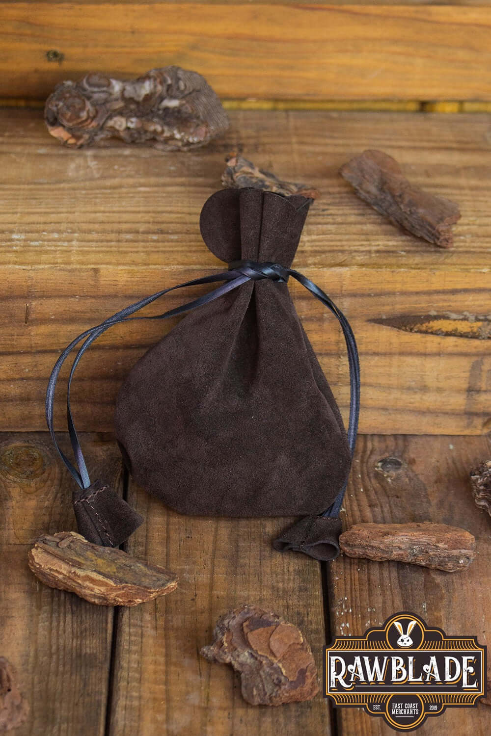 Alentorn Coin Bag by Rawblade, a soft split leather purse with drawstrings, perfect for stowing small items.
