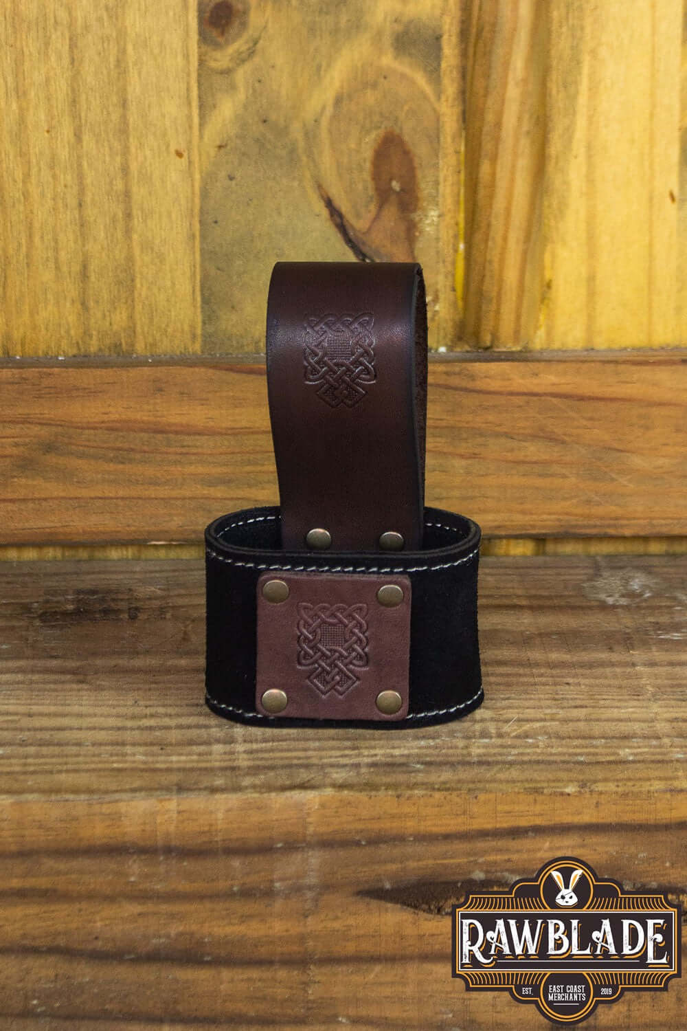 Wanderer Holder in high-quality split leather with Celtic designs and stitched borders.