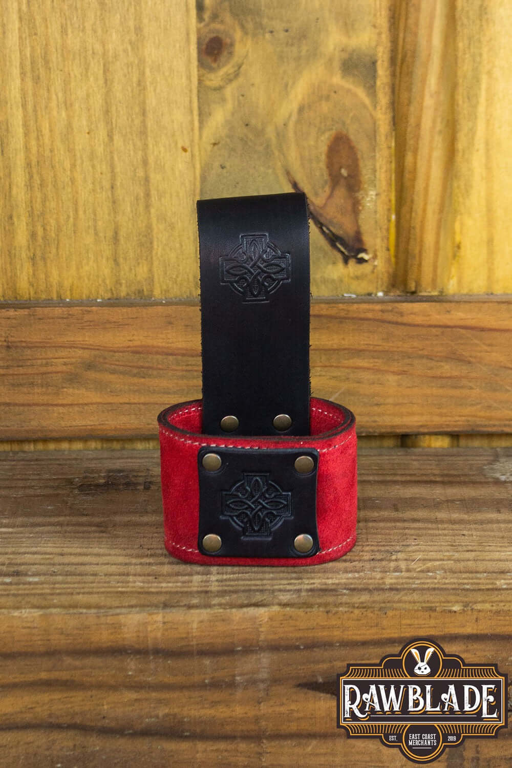 Wanderer Holder featuring engraved Celtic designs with high-quality split leather and old gold rivets.