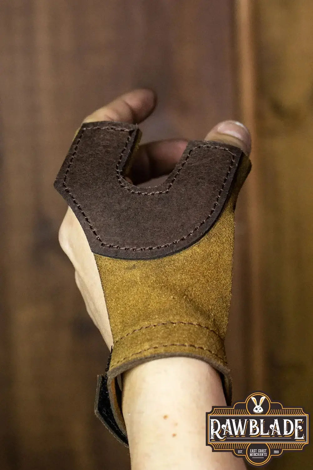 Archery Glove Oren displayed on a hand, showcasing high quality split leather and adjustable wrist with velcro.