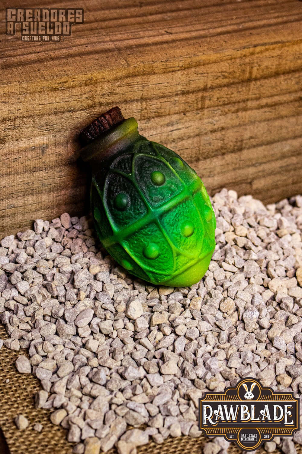 Alchemical Crock in green color on gravel surface for alchemists, mages, and wizards, made of safe foam.